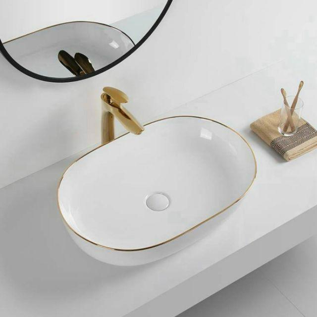 Lavabo sứ phủ men