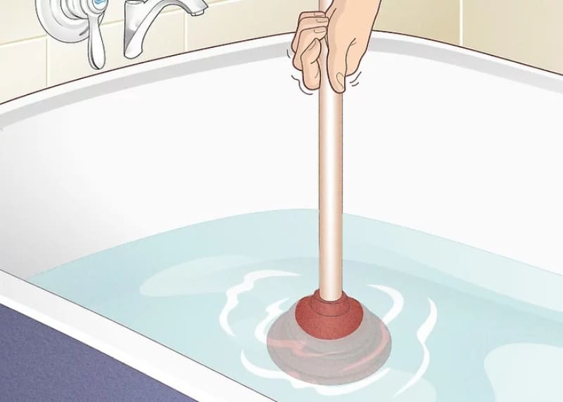 Dùng pittong thông nghẹt bồn tắm